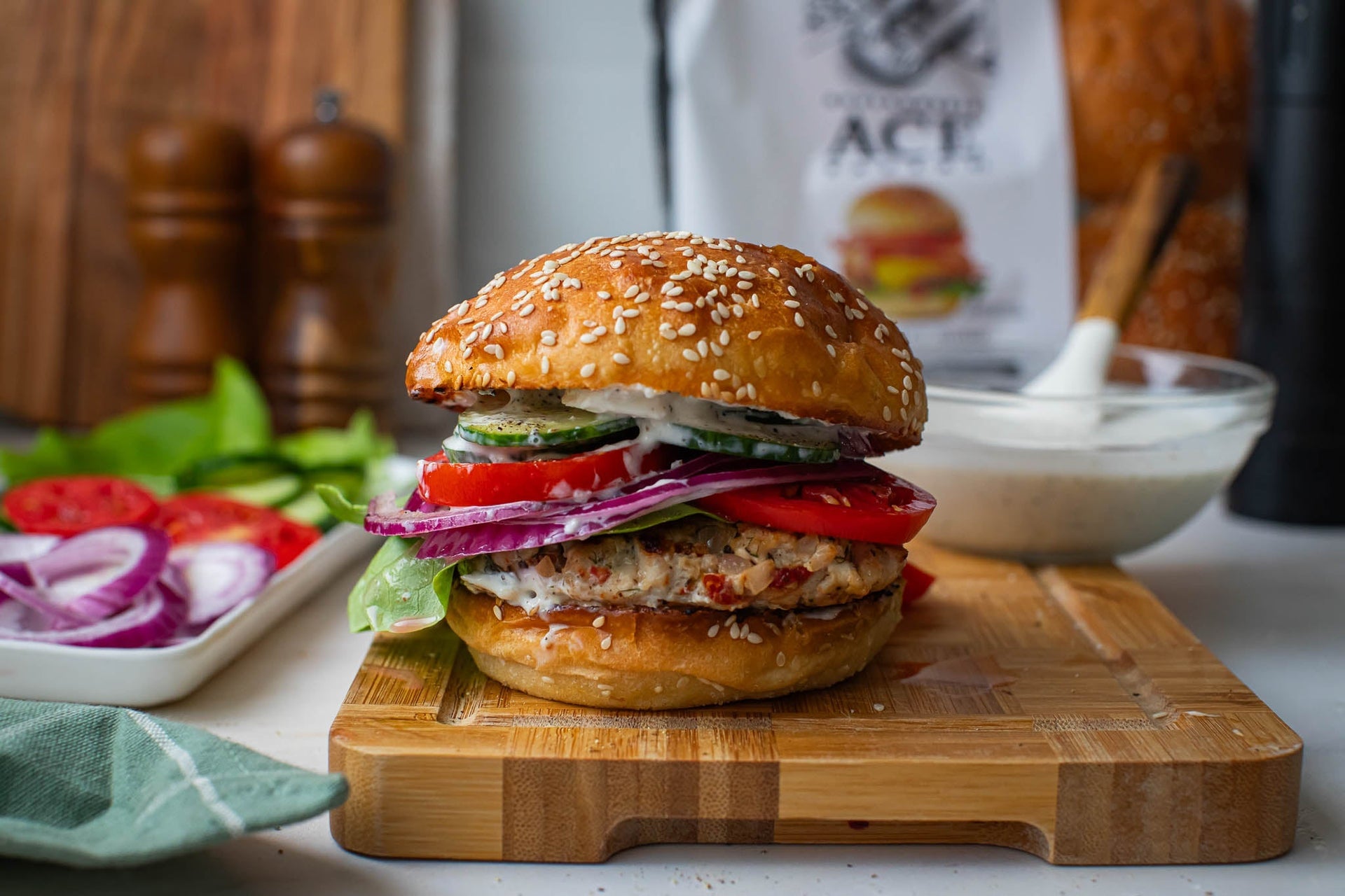 Greek Chicken Burgers with ACE Bakery® Sesame Buns