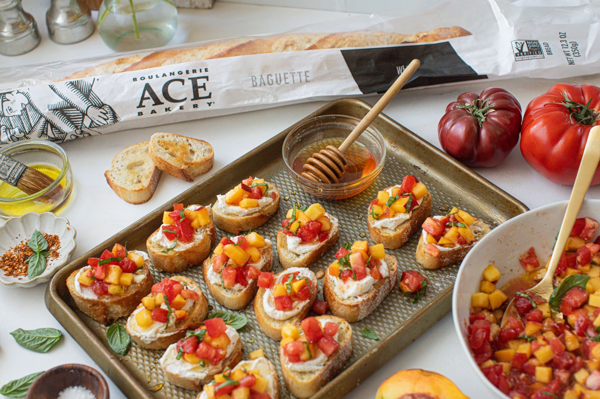 Peach Bruschetta with Whipped Lemon Goat Cheese & Hot Honey on ACE Bakery® Baguette