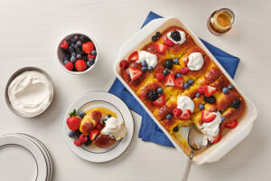 French Toast with Syrup, Fruit, and Whipped Cream